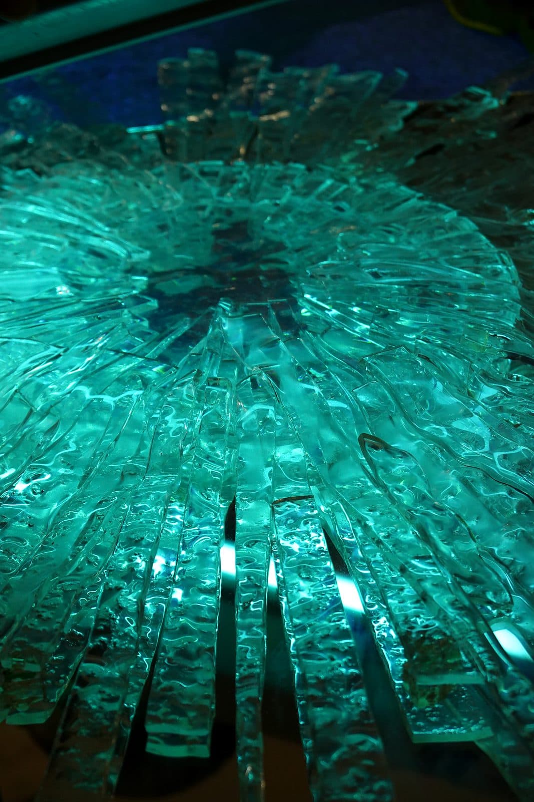 Strips of glass arranged into a composition on a light table